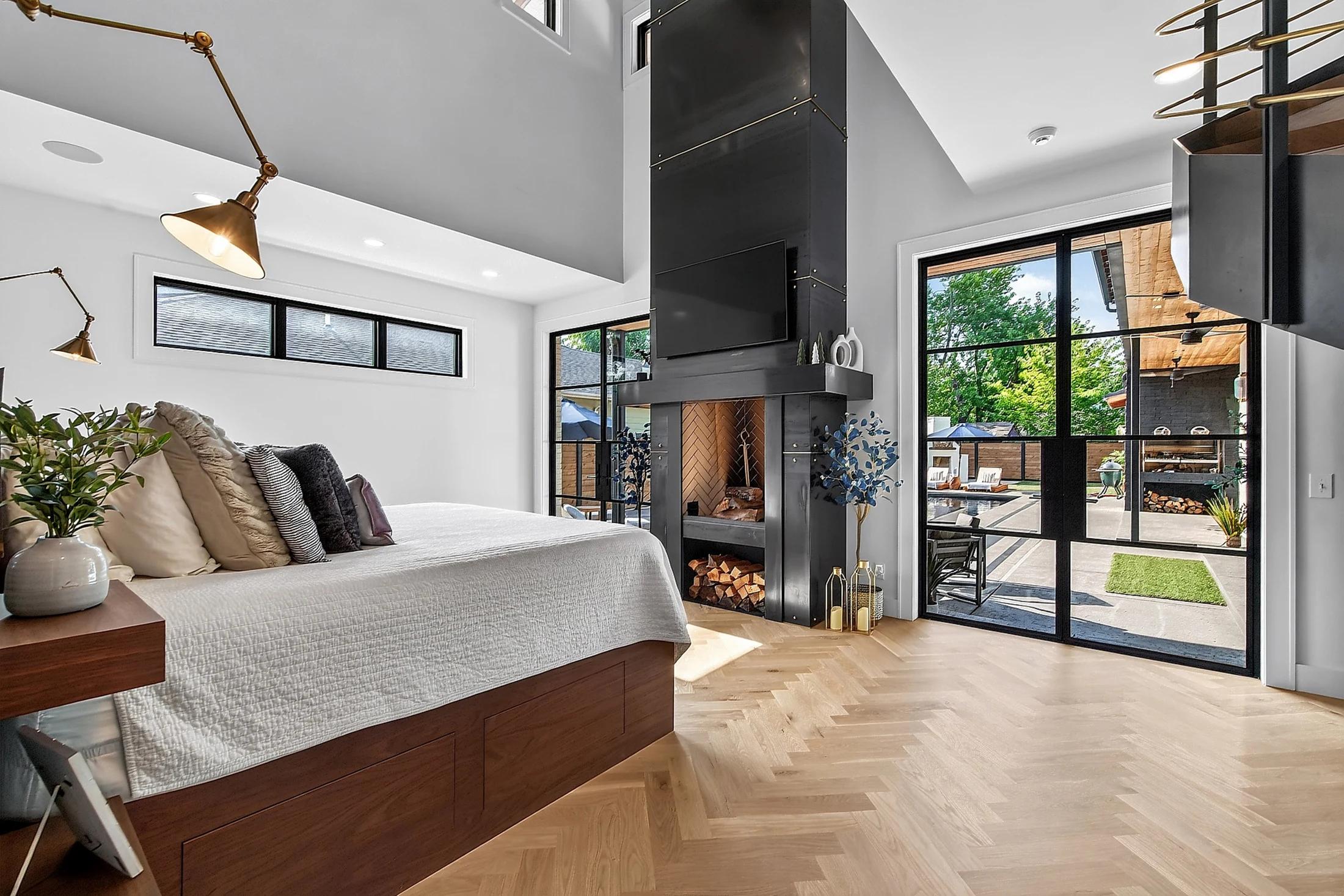The primary bedroom opening to the outdoors