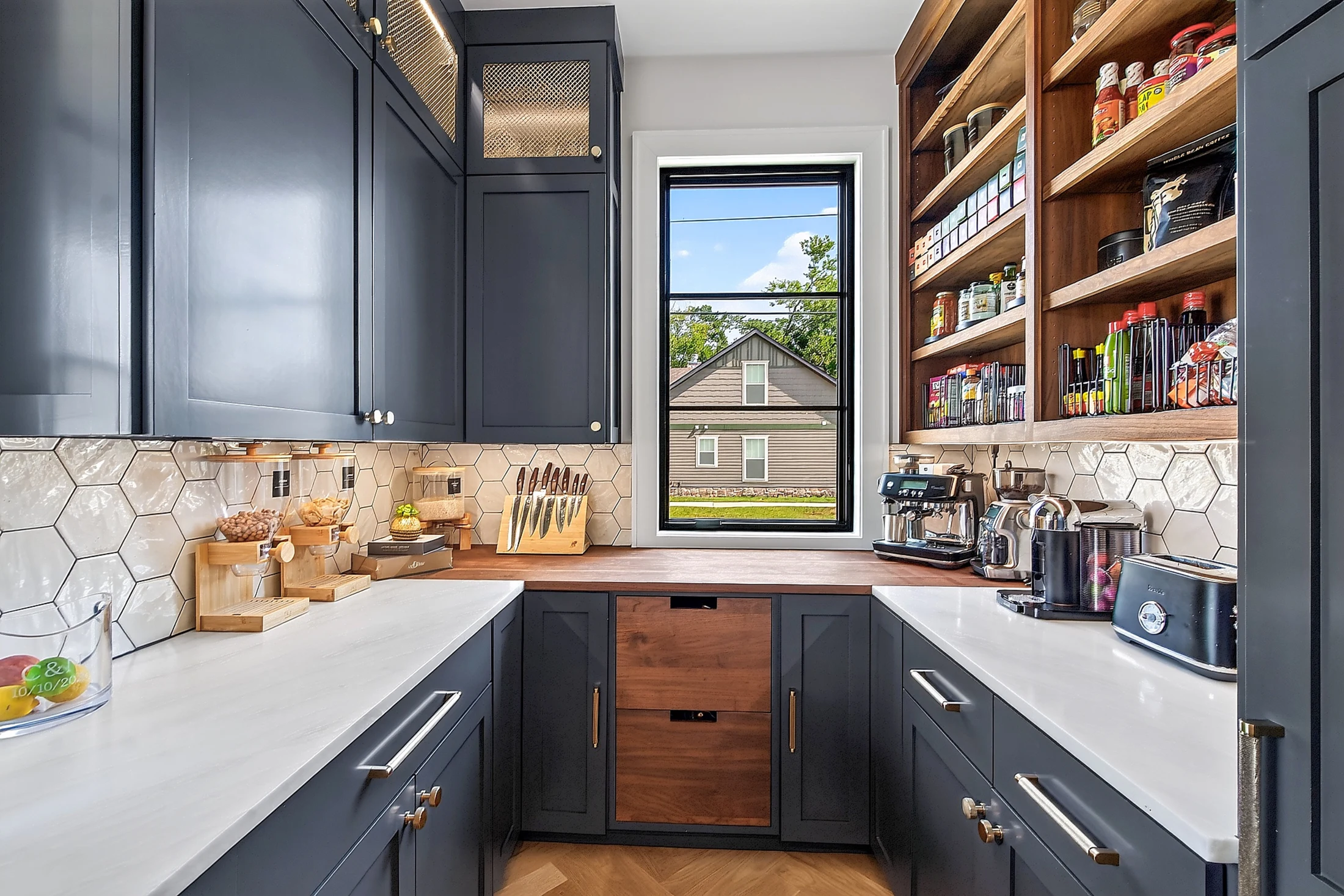 The working pantry with counter space and storage