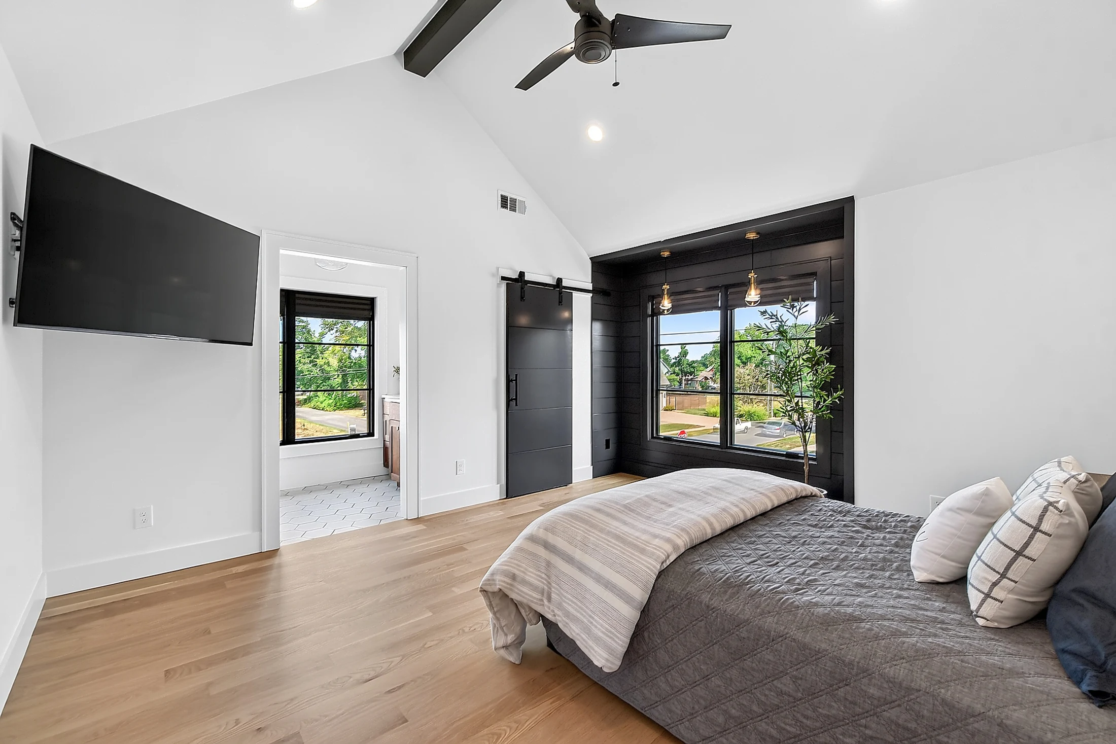 An upstairs bedroom with natural light