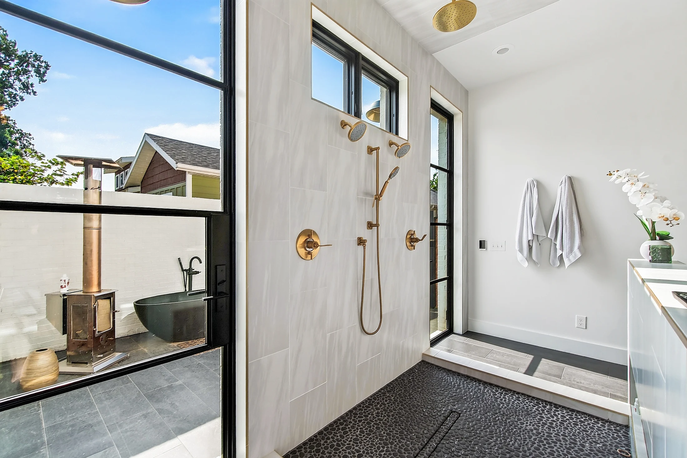 The primary bath opening to the private outdoor bath