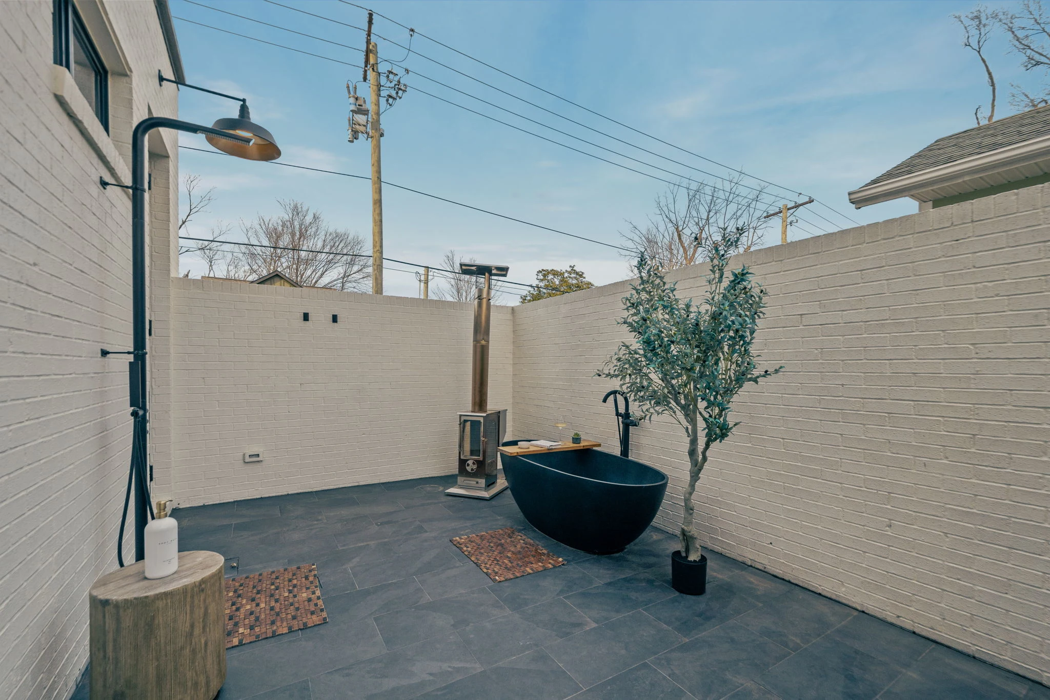 The private outdoor soaking tub and shower