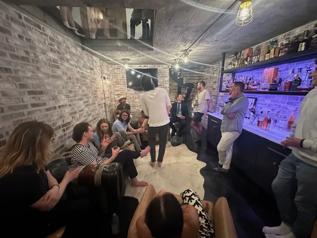 A gathering in the wine and bourbon cellar